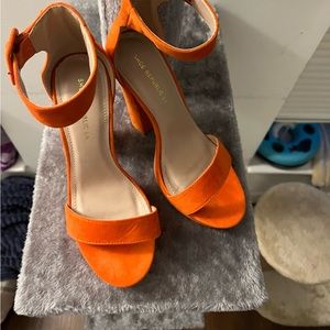 Orange size 7 shoe